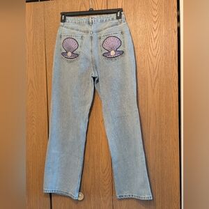 Forever 21 Light Blue Flare Jeans with Purple Clam Shell Design